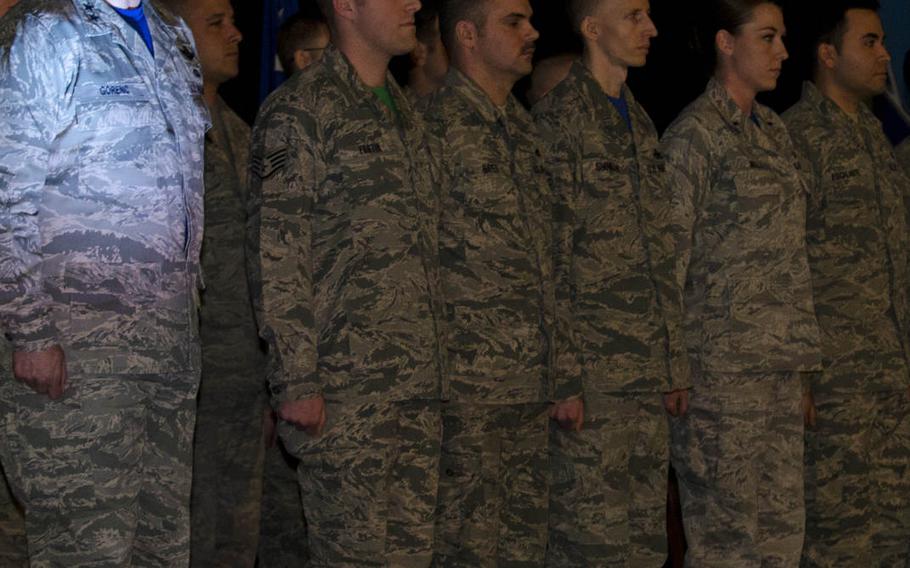 Gen. Frank Gorenc, commander of U.S. Air Forces in Europe- Air Forces Africa stands with airmen from RAF Lakenheath, England, during an awards ceremony on Friday, March 13, 2015. The Air Force awarded 15 commendation medals to airmen for their role during and after a Greek F-16 crash during a multinational exercise in Spain in January.