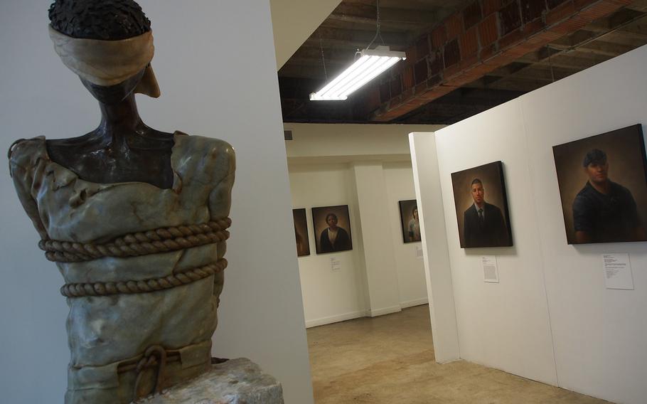 "POW Prisoner," by sculptor and Vietnam veteran John McManus, is displayed at the National Veterans Art Museum in Chicago. The non-profit museum displays works by and about veterans of all U.S. conflicts.
