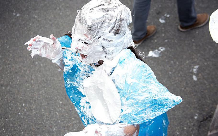 A Patch High School student is rendered unrecognizable during a March 12, 2015, shaving cream pie fight on Patch Barracks, Stuttgart, Germany. Students attempted to set a new world record for such pie fights. Courtesy Virginia Kozak