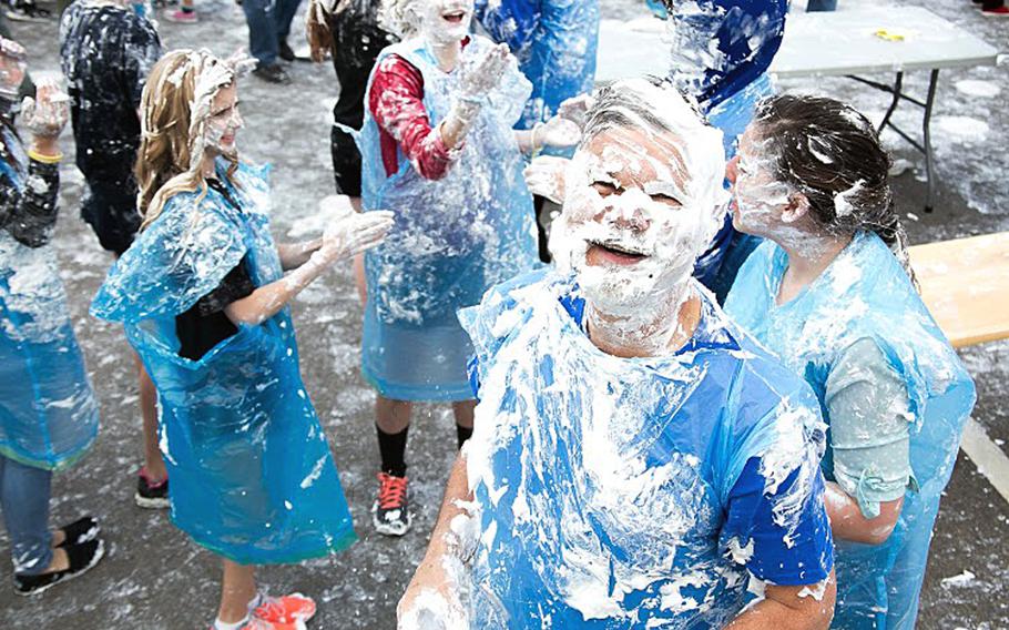 Patch High School Principal Danny Robinson couldn't escape the shaving cream during the pie fight on March 12, 2015, at Patch Barracks, Germany. The event, sponsored by the schools math honors society, was part of an effort to commemorate "Pi Day," which celebrates the mathematical constant 3.14. 
                Courtesy Virginia Kozak