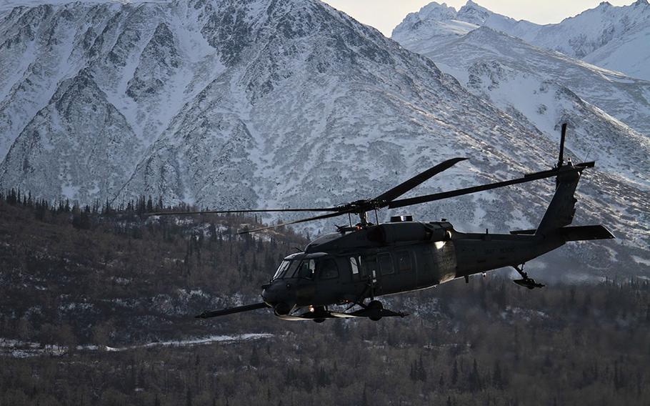 An Alaska Air National Guard HH-60 Pave Hawk from the 210th Rescue Squadron conducts a 2013 training flight near Joint Base Elmendorf-Richardson, Alaska.