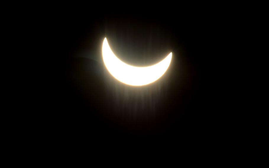 The moon moves across the face of the sun at 10:31 a.m. during a partial solar eclipse over Kaiserslautern, Germany, on the first day of spring, Friday, March 20, 2015.