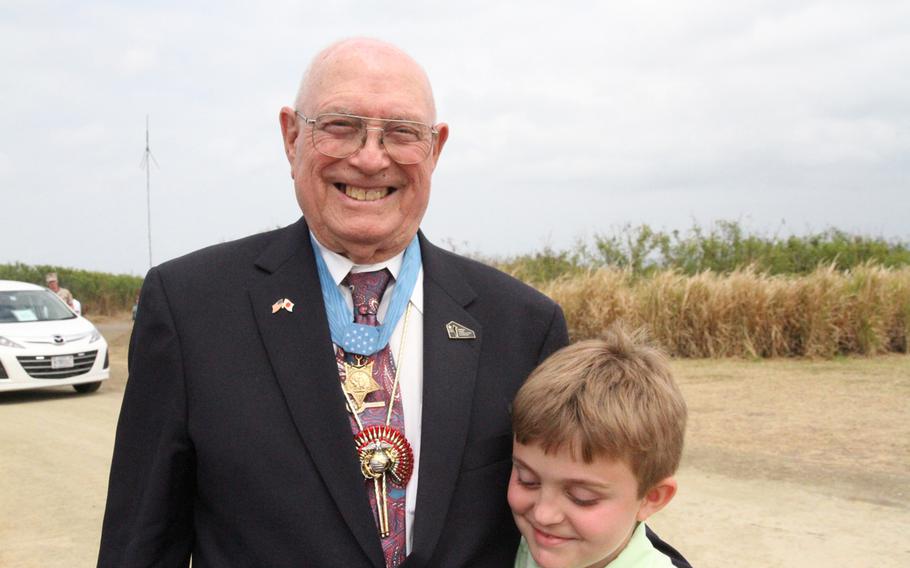 Hershel ''Woody'' Williams, left, the last living Medal of Honor recipient from the Battle of Iwo Jima attended the 70th anniversary ceremony of the battle with his great-grandson Benjamin Casey.