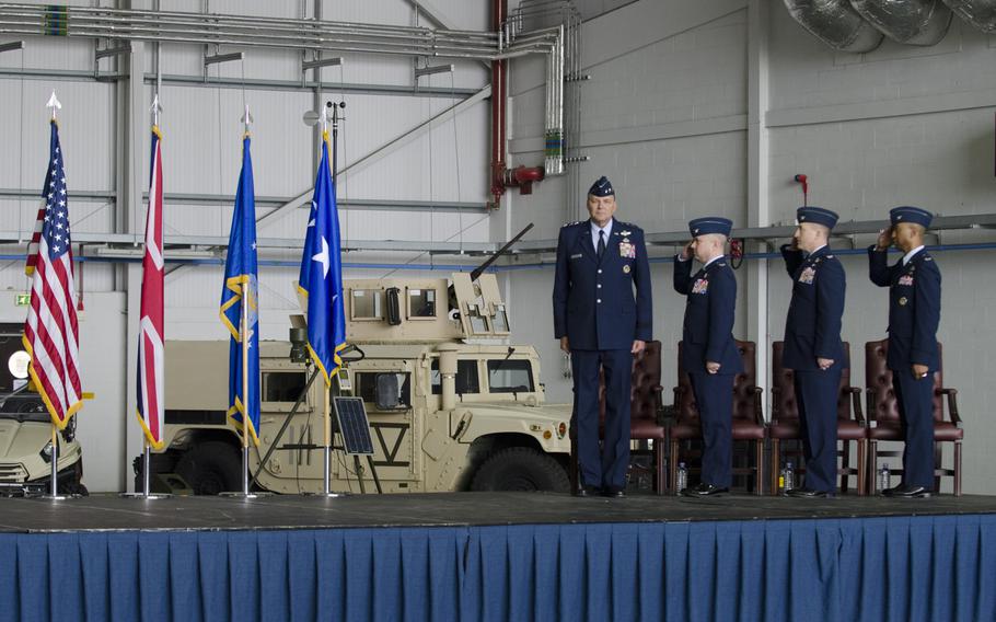 Lt. Gen. Bradley A. Heithold, commander of Air Force Special Operations, and commanders from the 352nd Special Operations Wing stand for the opening of an activation ceremony at RAF Mildenhall, England, on Monday, March 23, 2015. The ceremony marked the deactivation of the 352nd Special Operations Group and its subsequent reactivation as a wing. Adam L. Mathis/Stars and Stripes