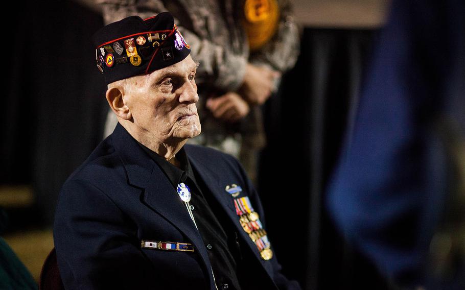 William L. Eldridge, a Bataan Death March survivor, watches the opening ceremonies OF the 26th Annual Bataan Memorial Death March at White Sands Missile Range, N.M., on March 22, 2015. Eldridge was among the more than 60,000 prisoners of war, who endured the 60-mile long March in the Philippines April 1942.