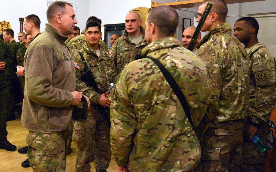 Lt. Gen. Ben Hodges, left, talks to soldiers of Troop L, 3rd Squadron, 2nd Cavalry Regiment in Alytus, Lithuania, on Sunday, March 22, 2015. The soldiers had been training in Lithuania and were then taking part in the regiment's Dragoon Ride from Lithuania and Estonia to their home base in Vilseck, Germany.