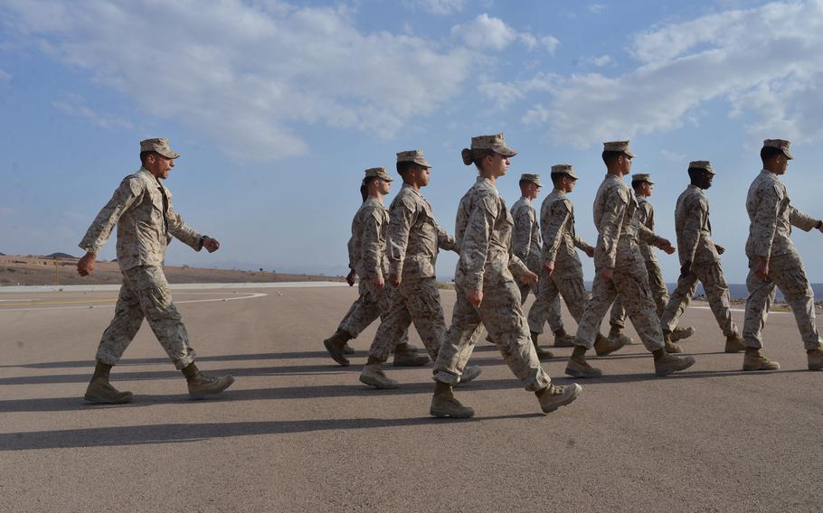 Marines at Camp Titin, Jordan, practice close-order drilling on May 14, 2015, as part of non-commissioned officer development during the annual exercise Eager Lion.