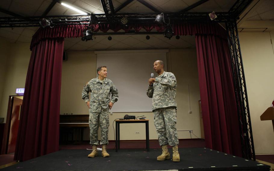 Lt. Gen. Jeffrey W. Talley, left, the Chief of Army Reserve and commanding general of U.S. Army Reserve Command, and Command Sgt. Maj. Luther Thomas Jr., his senior enlisted adviser, take questions during a town hall in Kaiserslautern, Germany, Tuesday, June 2, 2015.