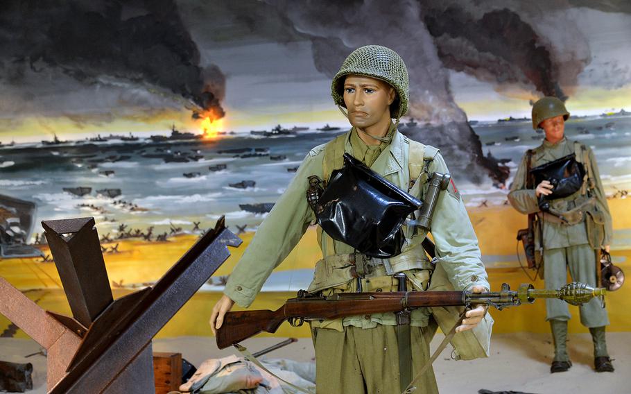 61p bs Michael Abrams/Stars and Stripes A display at the Omaha Beach Memorial Museum shows American soldiers on Omaha Beach on D-Day. The museum is just a short drive up from Omaha Beach in Saint-Laurent-sur-Mer, France.