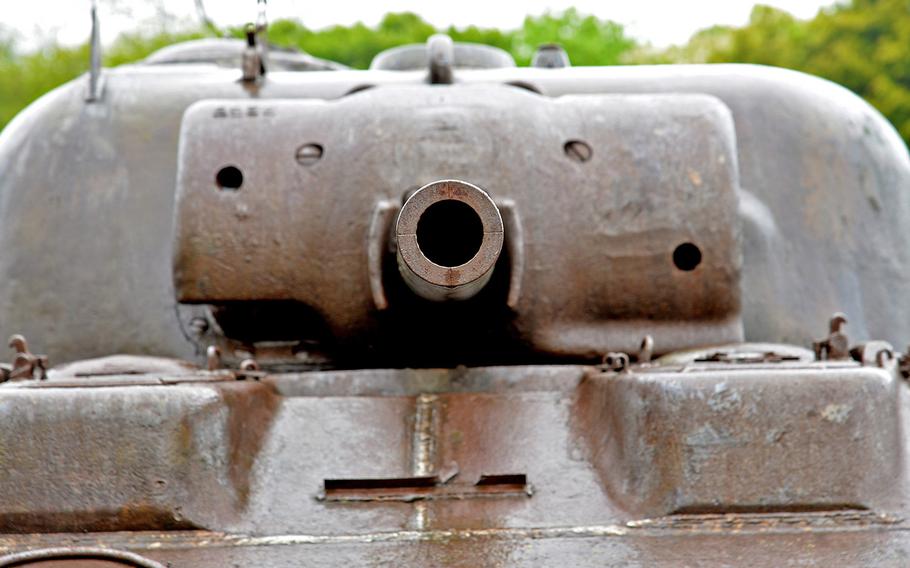 Looking down the barrel of a Sherman tank that stands in front of the Omaha Beach Memorial Museum near Omaha Beach in Saint-Laurent-sur-Mer, France.