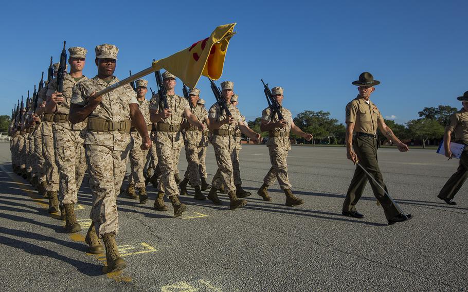Recruits of Platoon 3049, Company L, 3rd Recruit Training Battalion, march during the platoon?s initial drill evaluation June 1, 2015, on Parris Island, S.C.