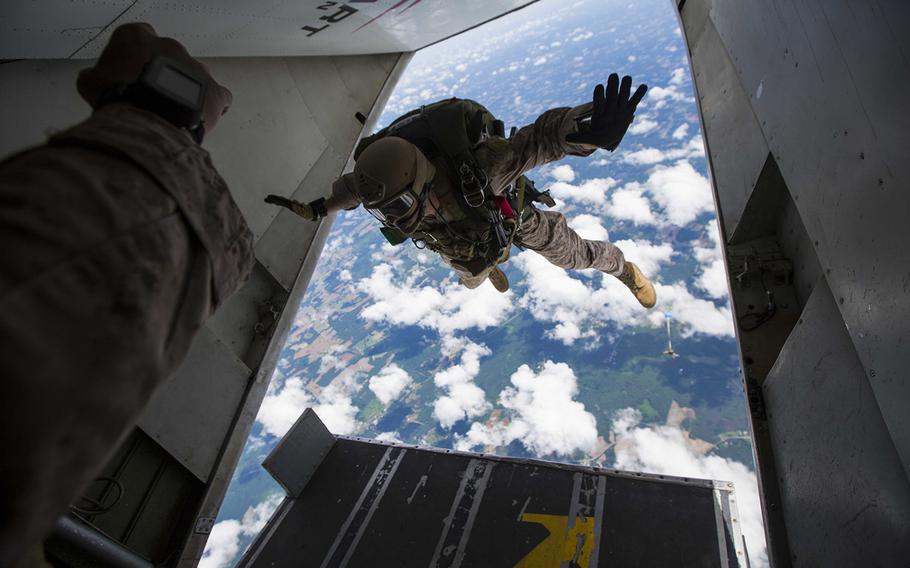 U.S. Marines assigned to Force Reconnaissance Platoon, Maritime Raid Force, 26th Marine Expeditionary Unit conduct a high altitude low opening jump during category 3 sustainment training in Louisburg, N.C., June 2, 2015.