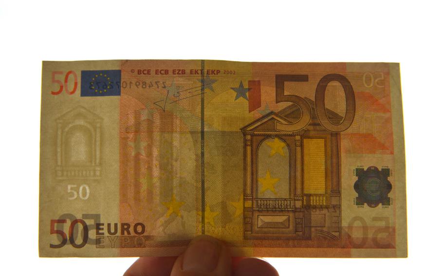 Holograms, watermarks and security strips are some ways to see if euro bills are real or counterfeit.