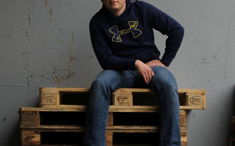 Airman 1st Class Jordan Holik, 19, sits on a stack of wooden pallets in this photograph posted to his Facebook page in April 2015. Holik died Friday, June 12, 2015, after a vehicle accident on the Autobahn A1 two days earlier.
