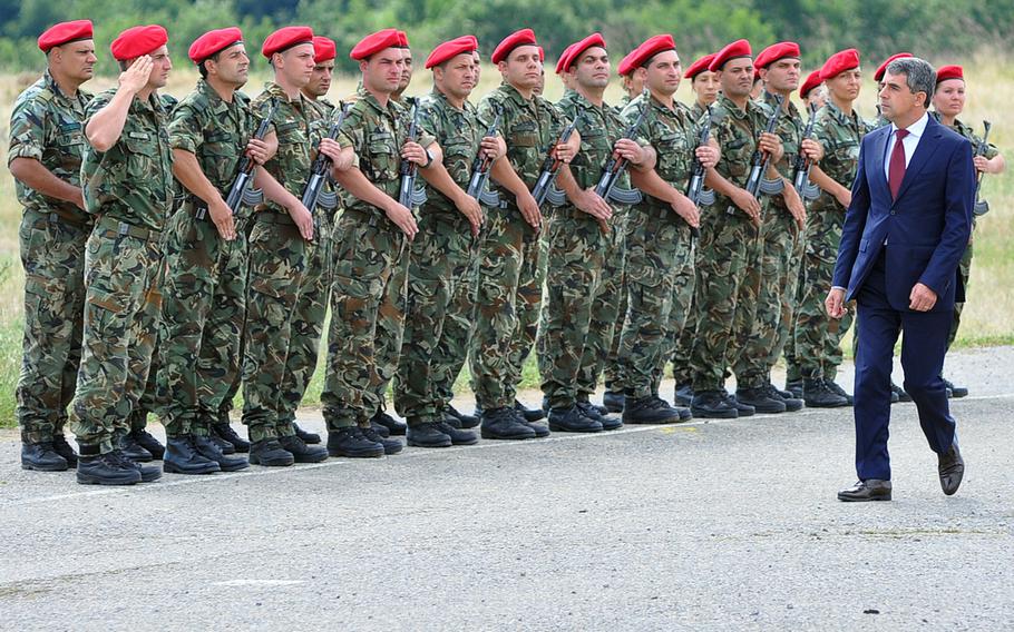 Bulgarian President Rosen Plevneliev inspects the troops before the live-fire exercise that closed the Kabile 2015 tactical exercise at Novo Selo Training Area, Bulgaria, on Thursday June 25, 2015.