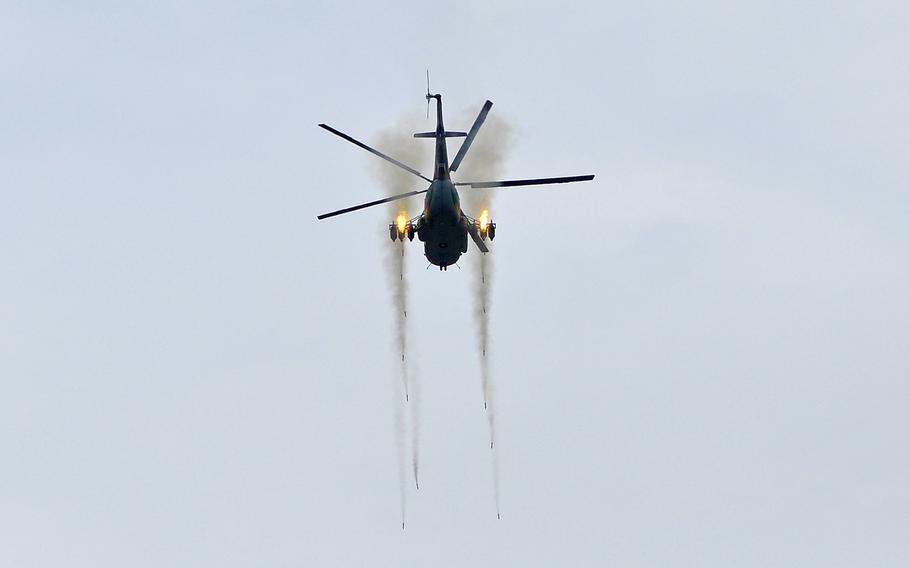 A Bulgarian Mi-17 helicopter fires rockets at a target during a live-fire exercise that closed the Kabile 2015 tactical exercise at Novo Selo Training Area, Bulgaria, on Thursday June 25, 2015.