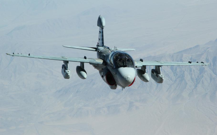 An EA-6B Prowler assigned to the Patriots of Electronic Attack Squadron 140, embarked aboard the aircraft carrier USS Dwight D. Eisenhower, prepares for an aerial refueling with an Air Force KC-135R Stratotanker during combat missions May 23, 2013.