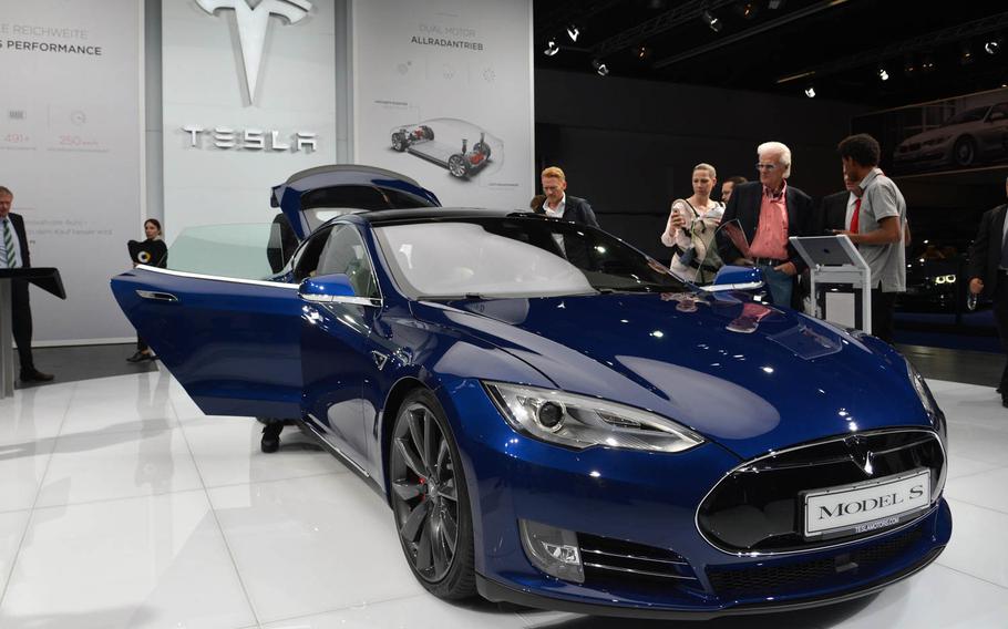 The Tesla Model S, a four-door electric sports car, drew a lot of looks at the International Motor Show in Frankfurt, Germany.