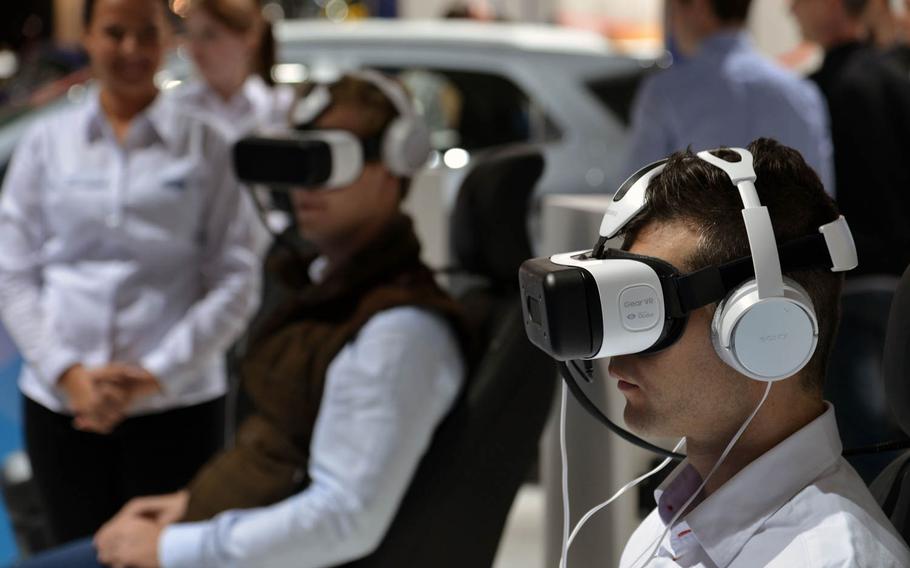 Visitors at the International Motor Show in Frankfurt, Germany, had a lot of virtual ways to see cars in action.