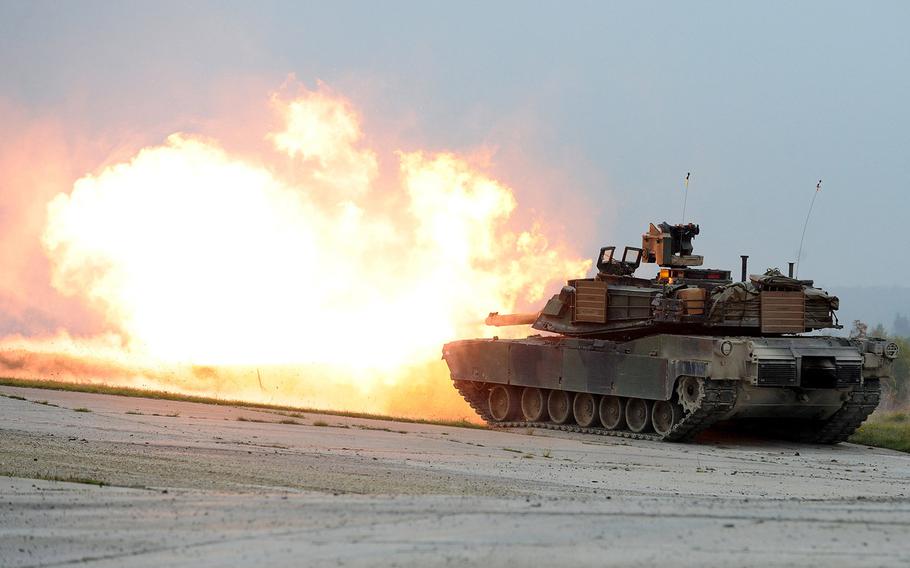 U.S. soldiers assigned to the 1st Armored Brigade Combat Team, 3rd Infantry Division, conduct gunnery with M1A2 Abrams tanks during the exercise Combined Resolve V at 7th Army Joint Multinational Training Command in Grafenwoehr, Germany, Oct. 8, 2015. The 1st Brigade soldiers replaces the 173rd Airborne Brigade as the the persistent training unit of Operation Atlantic Resolve, Monday, Oct. 26, 2015.