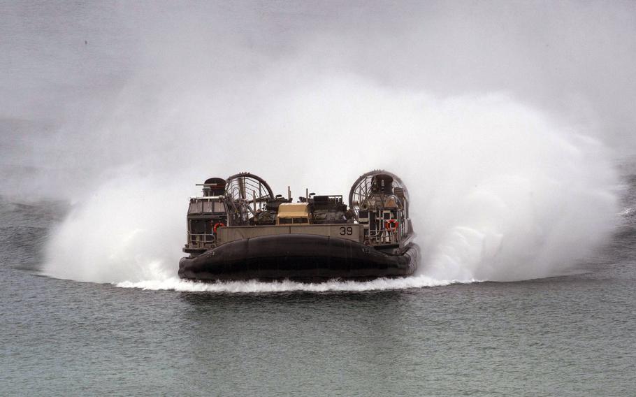 A landing craft air-cushion transports U.S.and Portuguese marines from the amphibious transport dock ship USS Arlington to Pinheiro Da Cruz, Praia Da Raposa beach in Portugal, to participate in a combined amphibious assault exercise as part of Trident Juncture 2015, Oct. 20, 2015. The Arlington, part of the Kearsarge Amphibious Ready Group, is conducting naval operations in the U.S. 6th Fleet area of operations.
