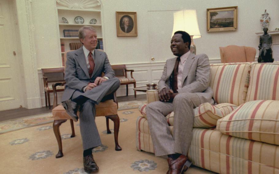 Major League Baseball Hall of Famer Hank Aaron, right, meets with President Jimmy Carter Aug. 15, 1978, in the Oval Office of the White House in Washington, D.C. Aaron, who held the career home-run record for 33 years, will be honored by Japan with the Order of the Rising Sun Thursday, Nov. 5, 2015, at the Imperial Palace in Tokyo.