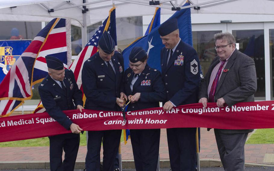 Air Force officials cut the ribbon for a new medical clinic at RAF Croughton, England, on Friday, Nov. 6, 2015. The clinic will provide primary, dental and mental health services to the base. Adam L. Mathis/Stars and Stripes