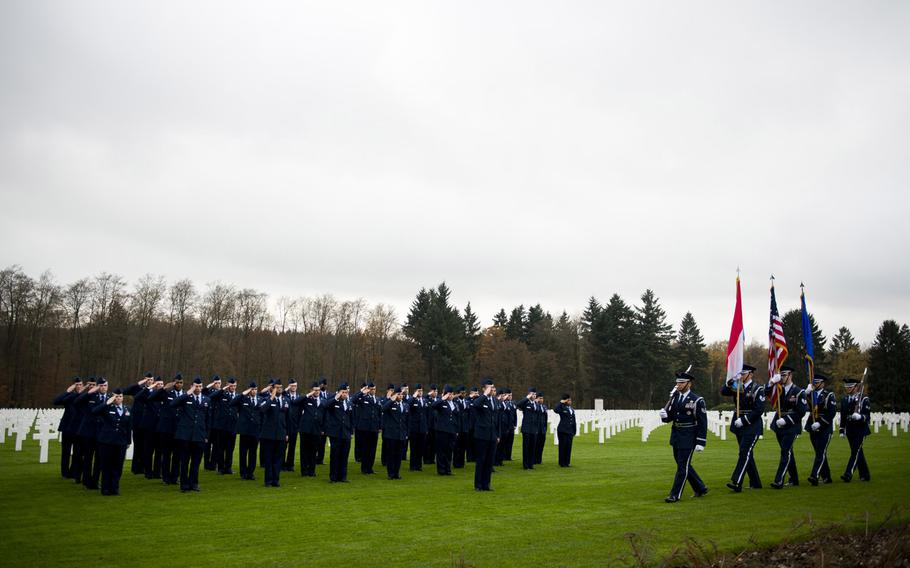 Airmen from the 52nd Fighter Wing post the colors during a Veterans Day ceremony at the Luxembourg American Cemetery, Luxembourg, on Wednesday, Nov. 11, 2015. The airmen traveled from Spangdahlem Air Base, Germany, to participate in the annual ceremony.