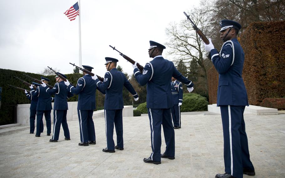 The 52nd Fighter Wing Honor Guard performs a 21-gun salute during a Veterans Day ceremony at the Luxembourg American Cemetery, Luxembourg, on Wednesday, Nov. 11, 2015. The honor guard traveled from Spangdahlem Air Base, Germany, to participate in the annual ceremony.