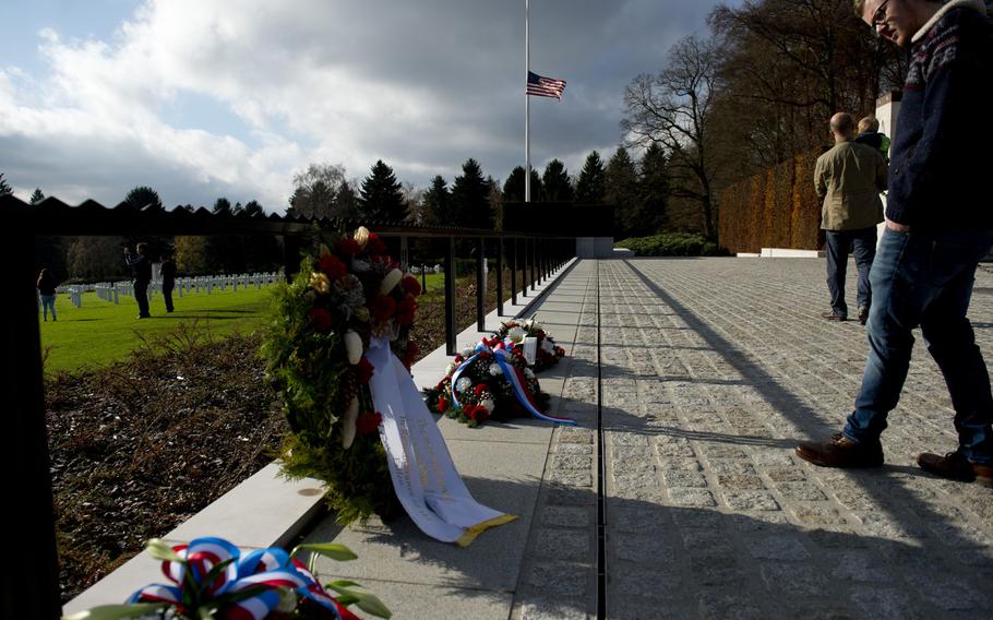 A visitor to the Luxembourg American Cemetery views wreaths laid during a Veterans Day ceremony, Luxembourg, on Wednesday, Nov. 11, 2015.
