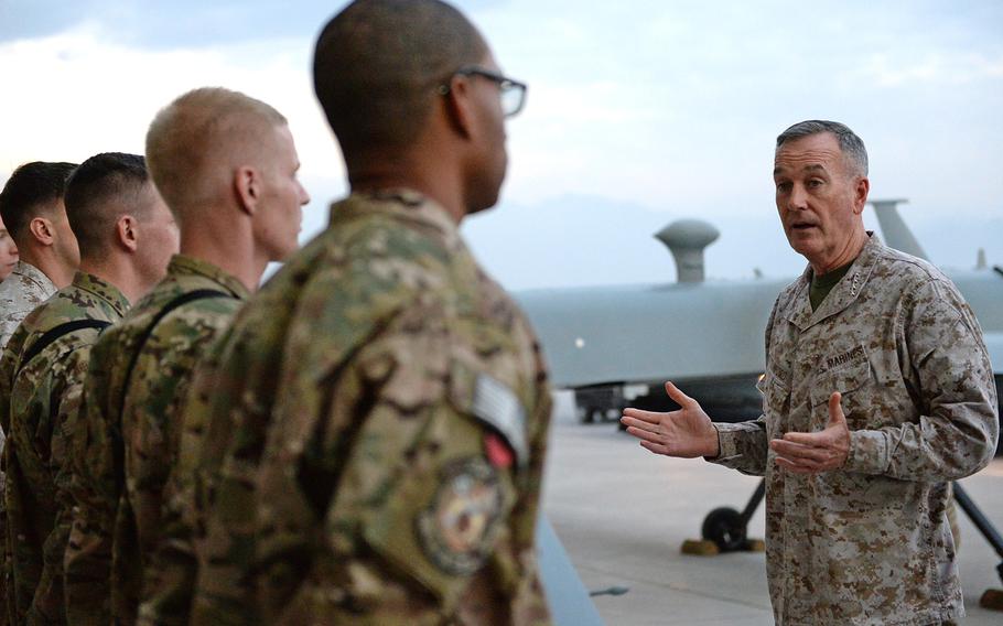Gen. Joseph Dunford, chairman of the Joint Chiefs of Staff, talks to troops at Bagram Air Field, Afghanistan, on Tuesday, Dec. 8, 2015, as part of a USO tour. Dunford said theres?s still years of work to be done to stabilize Afghanistan.