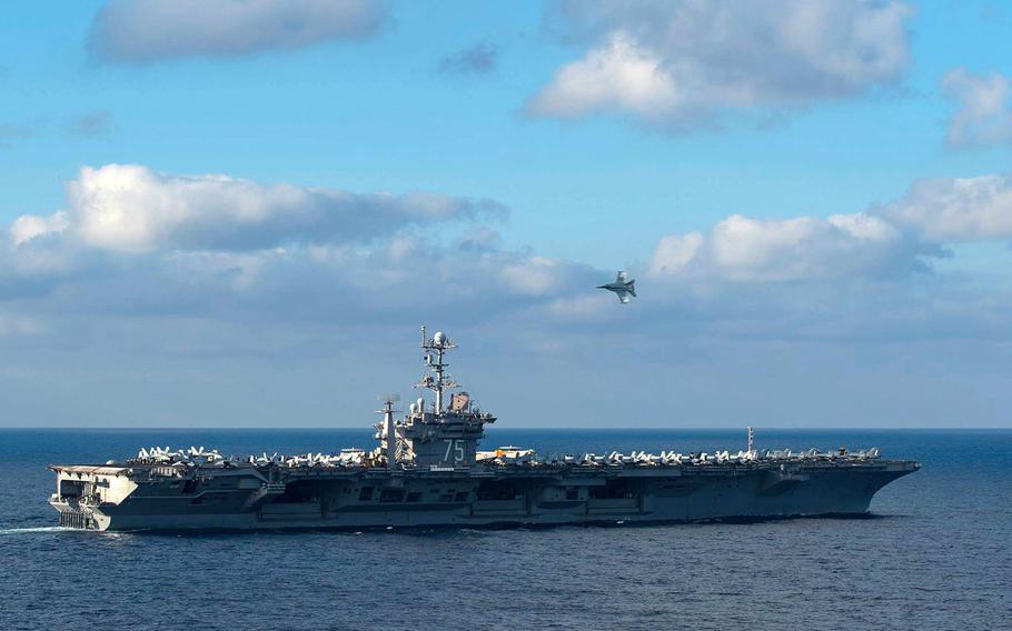 An F/A-18E Super Hornet begins a supersonic flyby over the flight deck of the aircraft carrier USS Harry S. Truman on Dec. 3, 2015. The Harry S. Truman Carrier Strike Group was conducting naval operations in the U.S. 6th Fleet area of operations but entered 5th Fleet AOR Dec. 14.