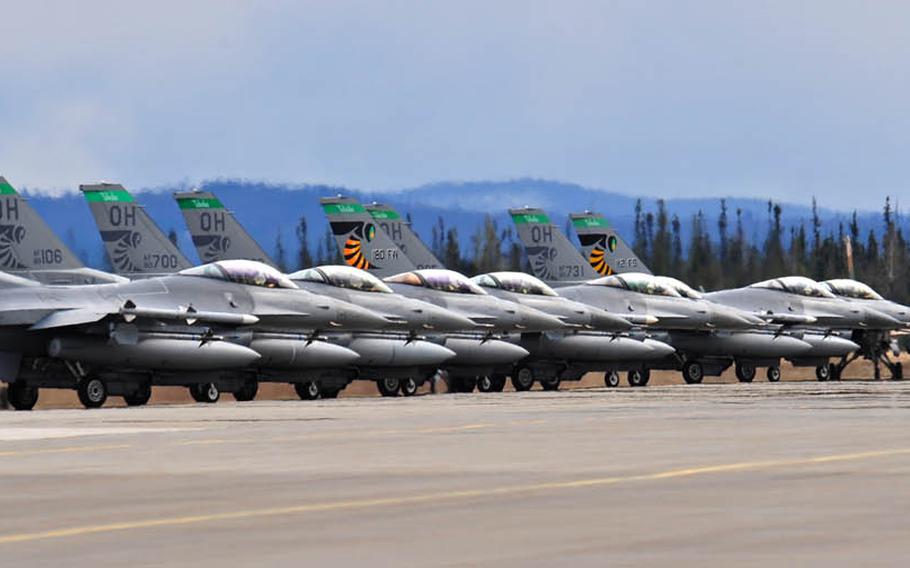 U.S. Air Force F-16 Fighting Falcons assigned to the 112th Fighter Squadron, Toledo Air National Guard Base, Ohio, wait on the flightline May 5, 2015, prior to take off during Red Flag-Alaska exercises at Eielson Air Force Base, Alaska. The squadron will deploy to Andersen Air Force Base this month to take over the theater security package mission from the 125th Expeditionary Fighter Squadron out of Kadena Air Base, Japan.