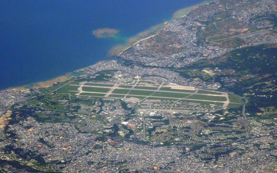 An aerial view of Kadena Air Base on Okinawa, Japan, in May 2010. Okinawan officials have requested access to the base to perform water tests after a banned organic compound was discovered in streams running through the base and in adjacent groundwater wells.