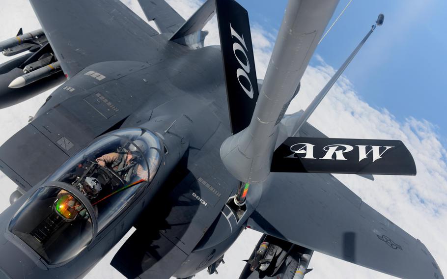 A KC-135 Stratotanker from the 100th Air Refueling Wing refuels an F-15E Strike Eagle from the 48th Fighter Wing, Thursday, Nov. 12, 2015, over the northern Mediterranean. The U.S and allies are now examining plans to strike hard against Islamic State militants in Libya, who have gained a foothold in the country in the years since the U.S.-led NATO alliance helped topple Moammar Gadhafi.