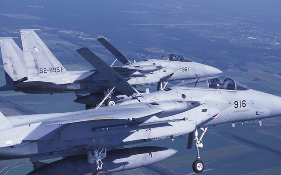 Japan plans to double the number of F-15 fighter jets based in southern Okinawa and establish a new Ground Self-Defense Force base on its western-most island, Yonaguni, in an effort to strengthen its southwestern defenses.
