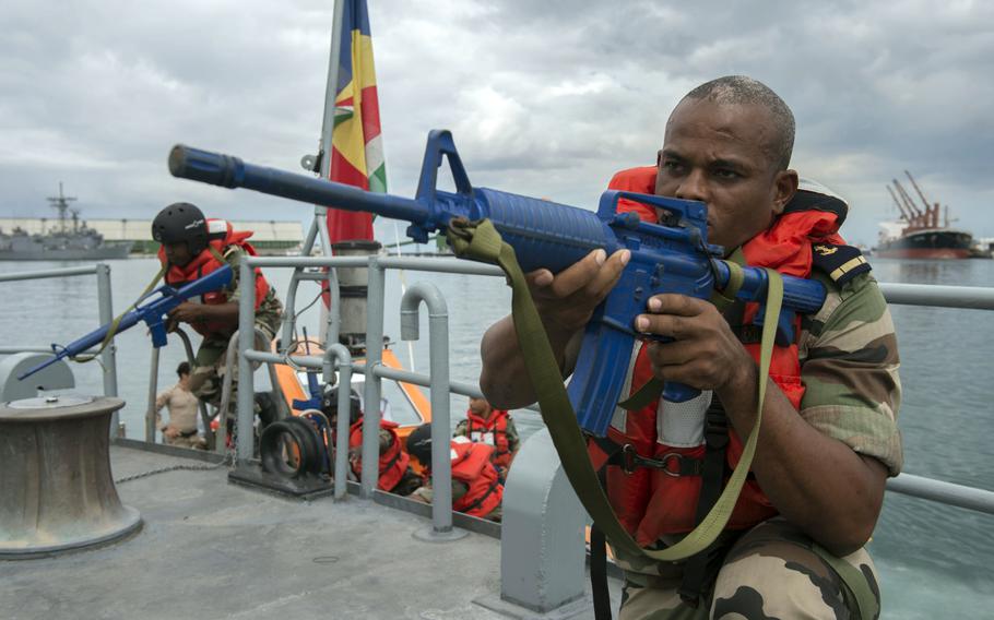 A Comoran boarding team practices boarding, room-clearing and tactical movement aboard the Seychelles People's Defense Forces patrol ship Andromache as part of Exercise Cutlass Express 2015, Jan. 30, 2015. This year's edition kicks off Saturday, Jan. 30, 2016.