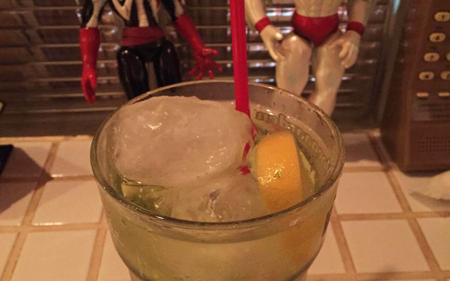 The Metroid at 8 Bit Cafe in Tokyo features Midori, vodka and tonic. It's a slightly tart, grapefruit-like cocktail that's tinted green by the melon liqueur.