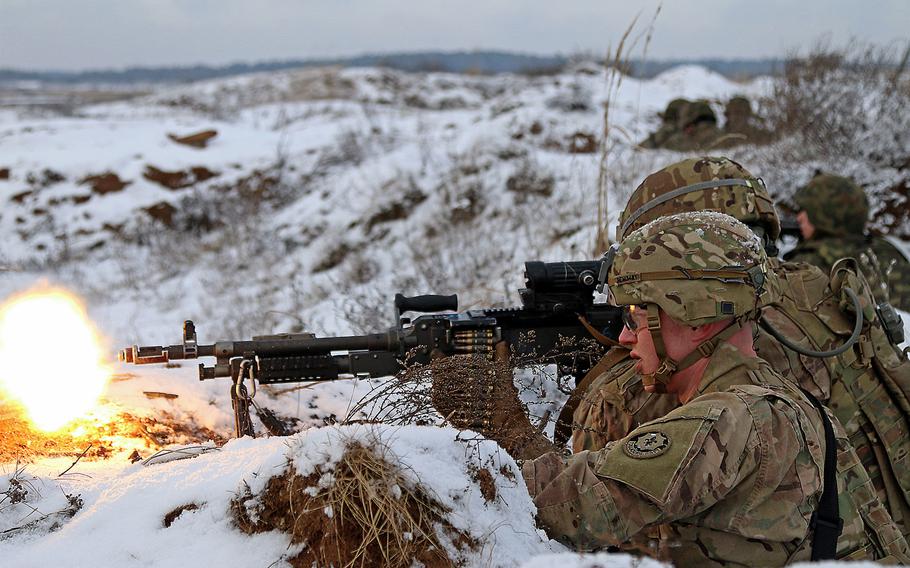 Spc. Ethan Mitchell, front, and Spc. Raymon Najera of the 3rd Squadron, 2nd Cavalry Regiment, fire their M240 machine guns during an exercise Jan. 18, 2016, at Konotop, Poland. The U.S. plans to spend $163 million next fiscal year on military exercises and $85 million on ''activities to build the capacity of European allies.''