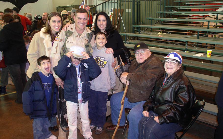 The Wellman family, taken at Campbell Army Airfield at Ft. Campbell, KY in March, 2004. Back row, left to right: Amber Wellman Mines (daughter), Fred Wellman, Crystal Wellman. Front Row: Hunter Wellman (son), Morgan Wellman (daughter), Dylan Malvano (son), John E.J. Wellman (father) and Lois Wellman (mother).