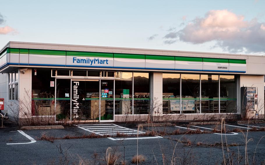 An abandoned convenience store along the highway in the ghost town of Futaba, Japan, Feb. 10, 2016, has remained vacant since the city was evacuated five years ago following the disaster at the Fukushima Dai-ichi nuclear power plant less than 10 miles up the road.