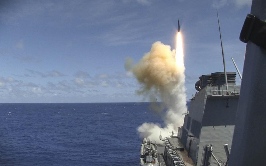 The guided-missile destroyer USS Curtis Wilbur launches a missile during Multi-Sail 2015, an annual Destroyer Squadron 15 exercise designed to assess combat systems, improve teamwork and increase warfighting capabilities in the 7th Fleet area of responsibility.