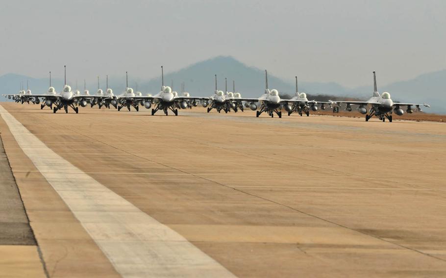 F-16 Fighting Falcons perform an elephant walk at Kunsan Air Base, South Korea, in 2011. The base was locked down for two hours Tuesday, March 8, 2016, after what turned out to be a false report of an active shooter.