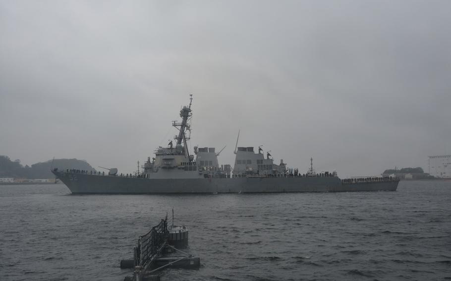The destroyer USS Barry arrives at Yokosuka Naval Base, Japan, the ship's new homeport, on March 14, 2016. USS Barry becomes the seventh ballistic missile defense-capable ship based at Yokosuka.