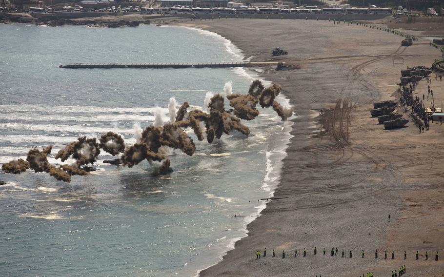 Korean Assault Amphibious Vehicles with Republic of Korea Marine Corps Regimental Landing Team 7 take part in a beach landing March 12, 2016, during exercise SsangYong 16.