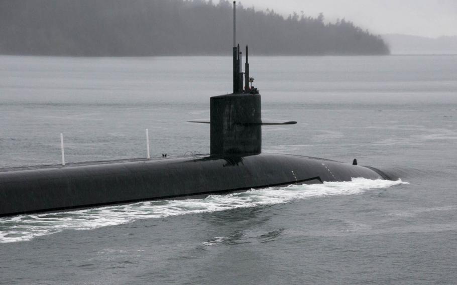 The Ohio-class ballistic-missile submarine USS Kentucky departs Naval Base Kitsap-Bangor, Wash., Sunday, March 13, 2016, for its first strategic deterrent patrol since 2011.