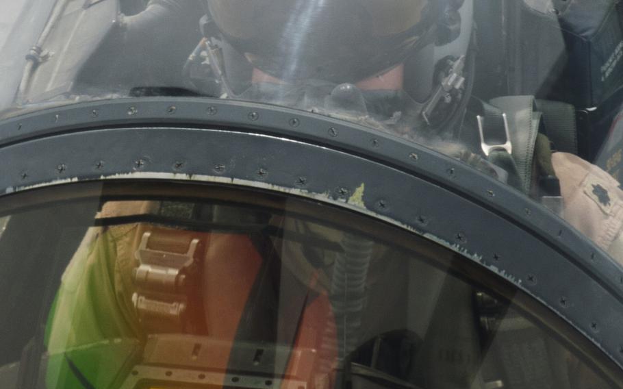 An F-15 pilot waits while his fighter aircraft is refueled by a KC-135 Stratotanker on March 24, 2016.