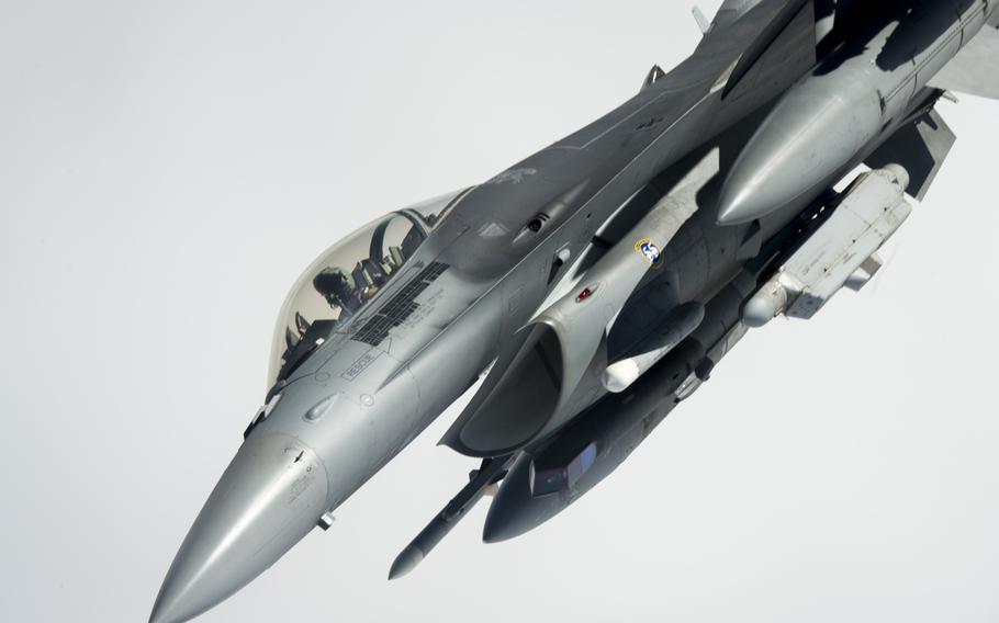 An F-16 fighter supporting operations against the Islamic State in Iraq and Syria maneuvers away from a KC-135 Stratotanker after an aerial refueling on March 24, 2016.