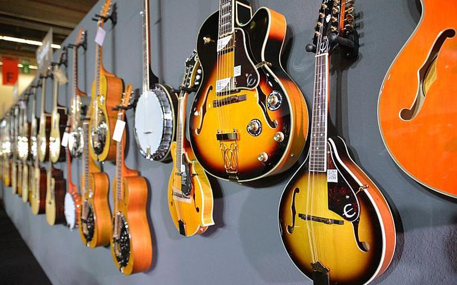 A variety of Epiphany acoustic string instruments on display at the Musikmesse in Frankfurt, Germany, Thursday, April 7, 2016.