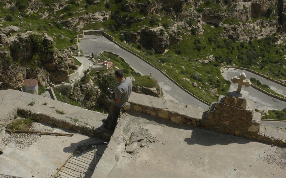 A steep road full of hairpin turns leads to the Sant Hormizd Monastery in northern Iraq.